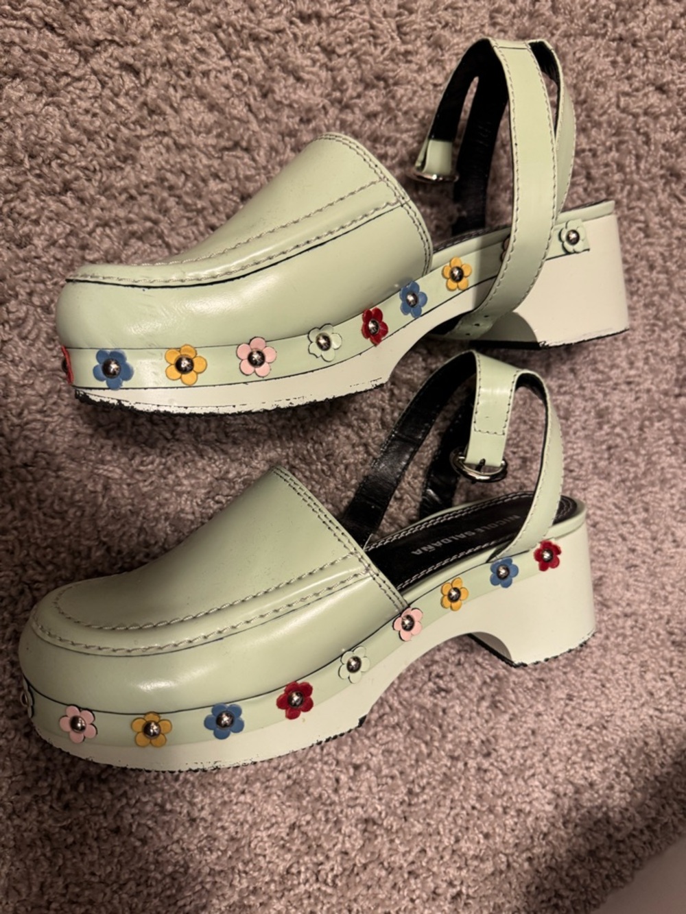 Pastel Green Floral-Trim Clog Sandals
NICOLE SALDAÑA